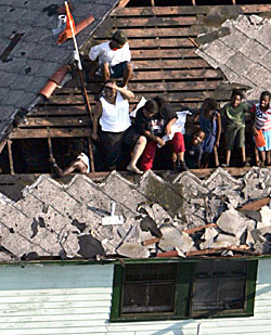 Residents wait 
on a rooftop to be evacuated from the floodwaters Aug. 31 in New Orleans.
Smiley N. Pool/The Dallas Morning News, The Associated Press